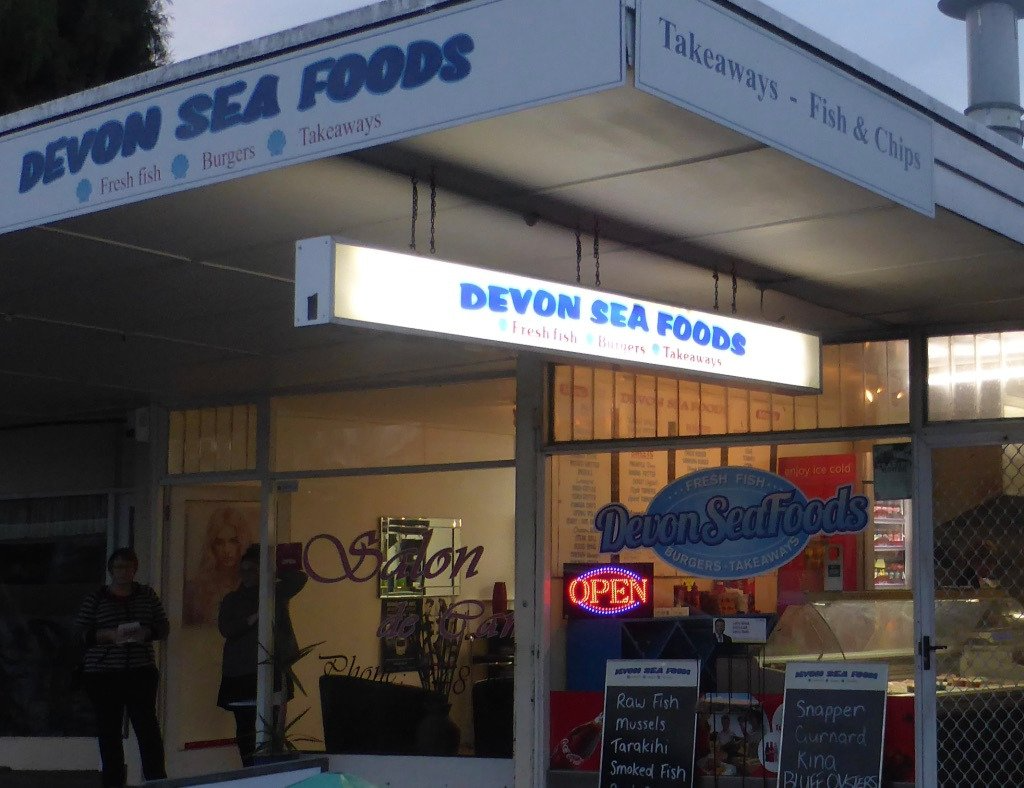 A storefront featuring a sign that reads "Beyon Sea Foods," inviting customers to explore its seafood offerings